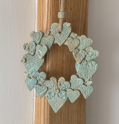 Duck Egg Ceramic Heart wreath on jute ribbon.
