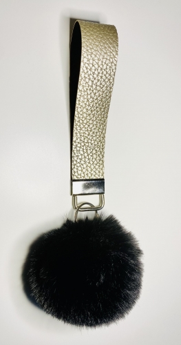 Wristlet keychain with a pom pom Gold / black 