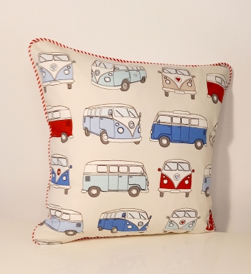 'Winston' cushion featuring camper van design in multi colours with stiped piping detail.