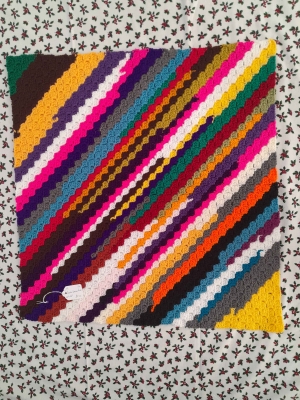 crocheted LapMat called Purple Seaside Rock 56cm x 56cm